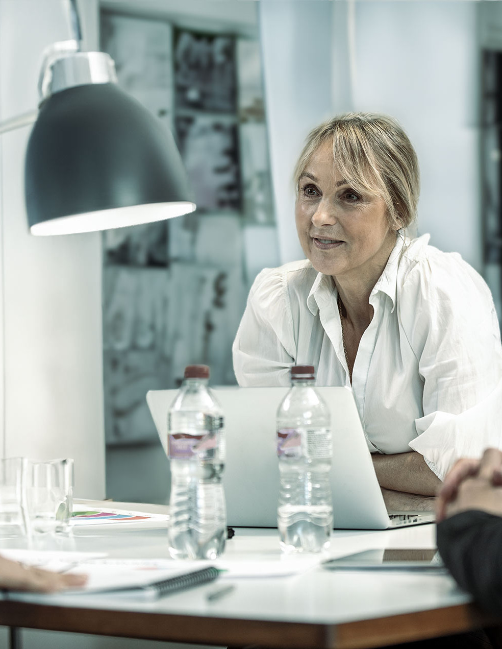 Leadership and culture: Female manager at a meeting