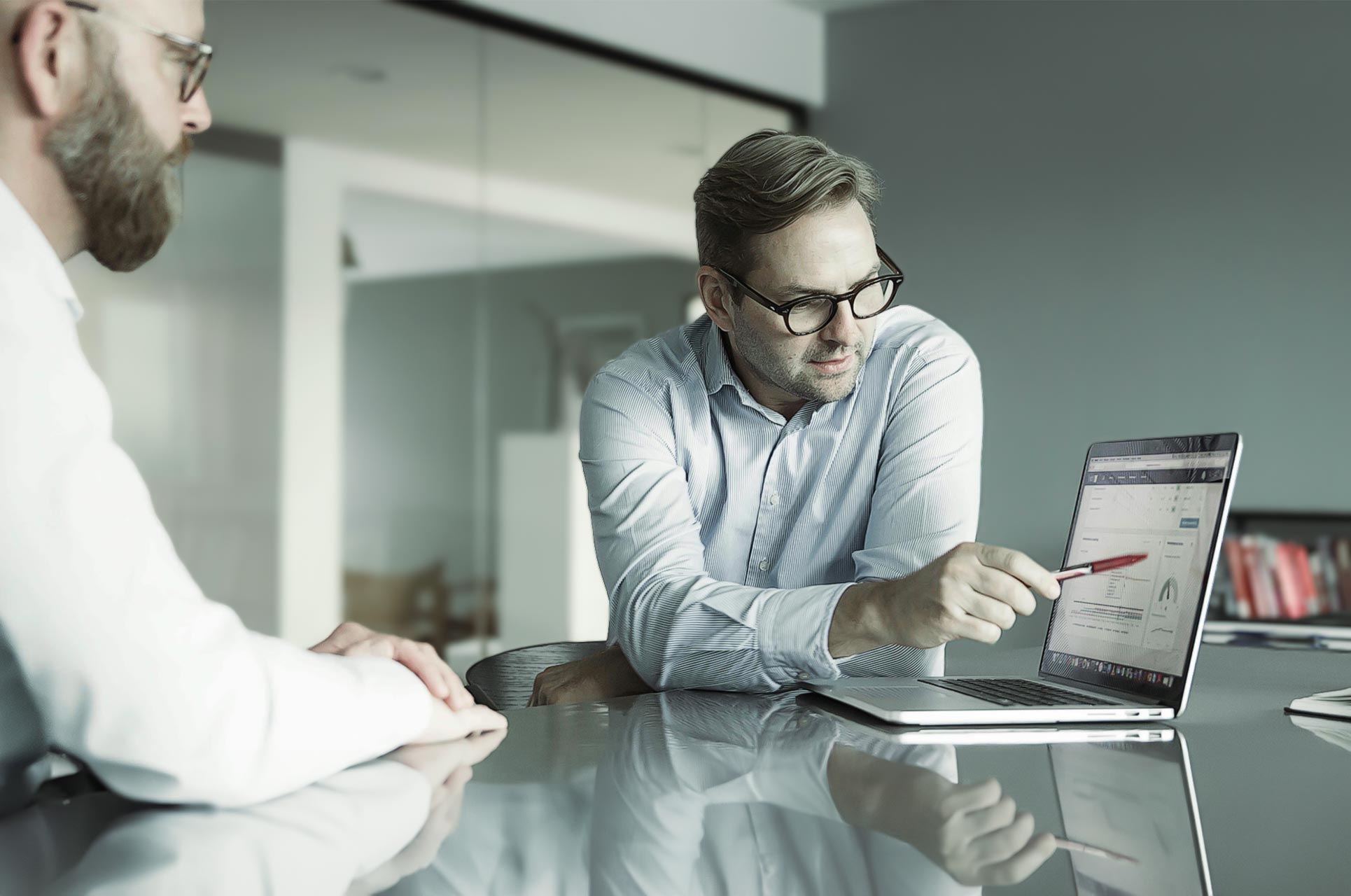 Manager giving feedback to colleague