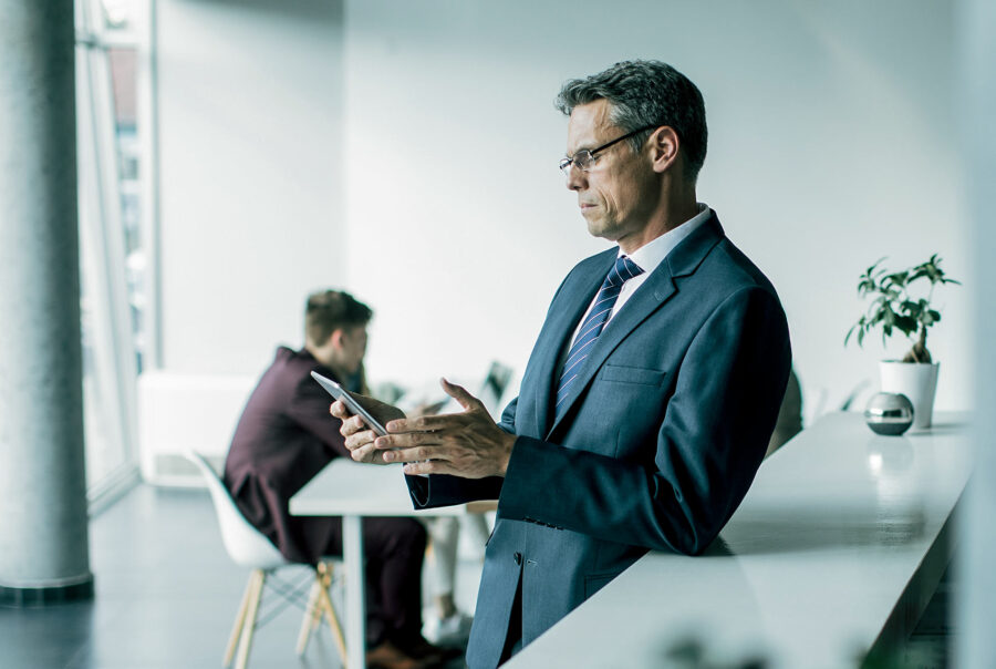 Older businessman reviewing case before presentation